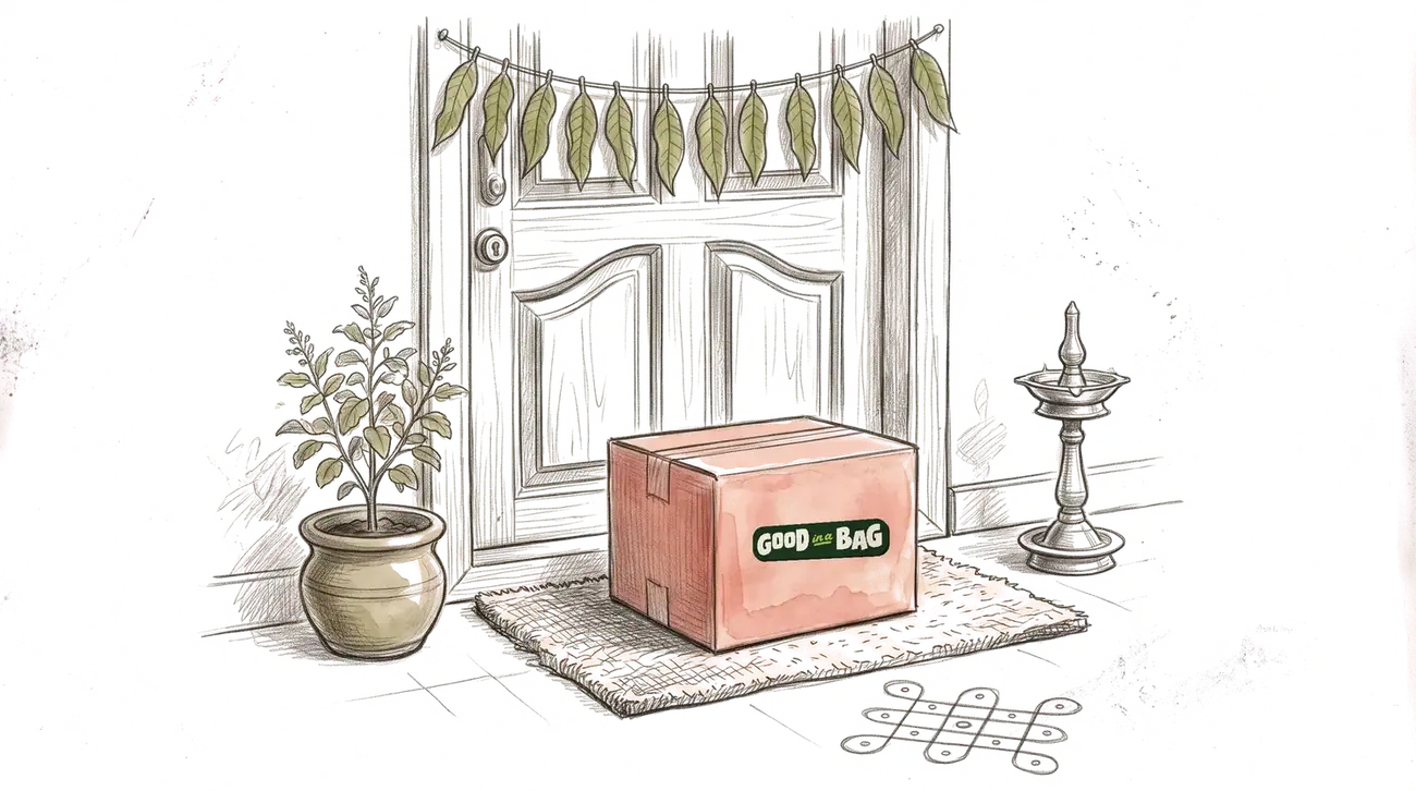 A red box on a doormat by a teal door